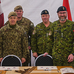 Lieutenant-Colonel Craig Higgins, second from right, officially became the Commanding Officer (CO) of the enhanced Force Presence (eFP) Battle Group (BG) Latvia from outgoing CO LCol Jesse Van Eijk in a Change of Command ceremony that was held December 13, 2022 at Camp Ādaži in Ādaži, Latvia. Photo By Sergeant First Class Jesus Aguilera, Spanish Army.