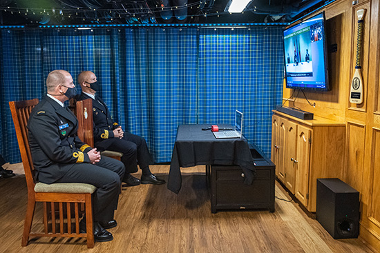 Caption: Incoming and outgoing Commanders of Standing NATO Maritime Group One, Commodore Peats and Commodore Mirones, attend a change of command ceremony video teleconference with Vice Admiral Blount, Commander NATO Maritime Command, in Her Majesty’s Canadian Ship Halifax in Lisbon, Portugal on January 18, 2021.