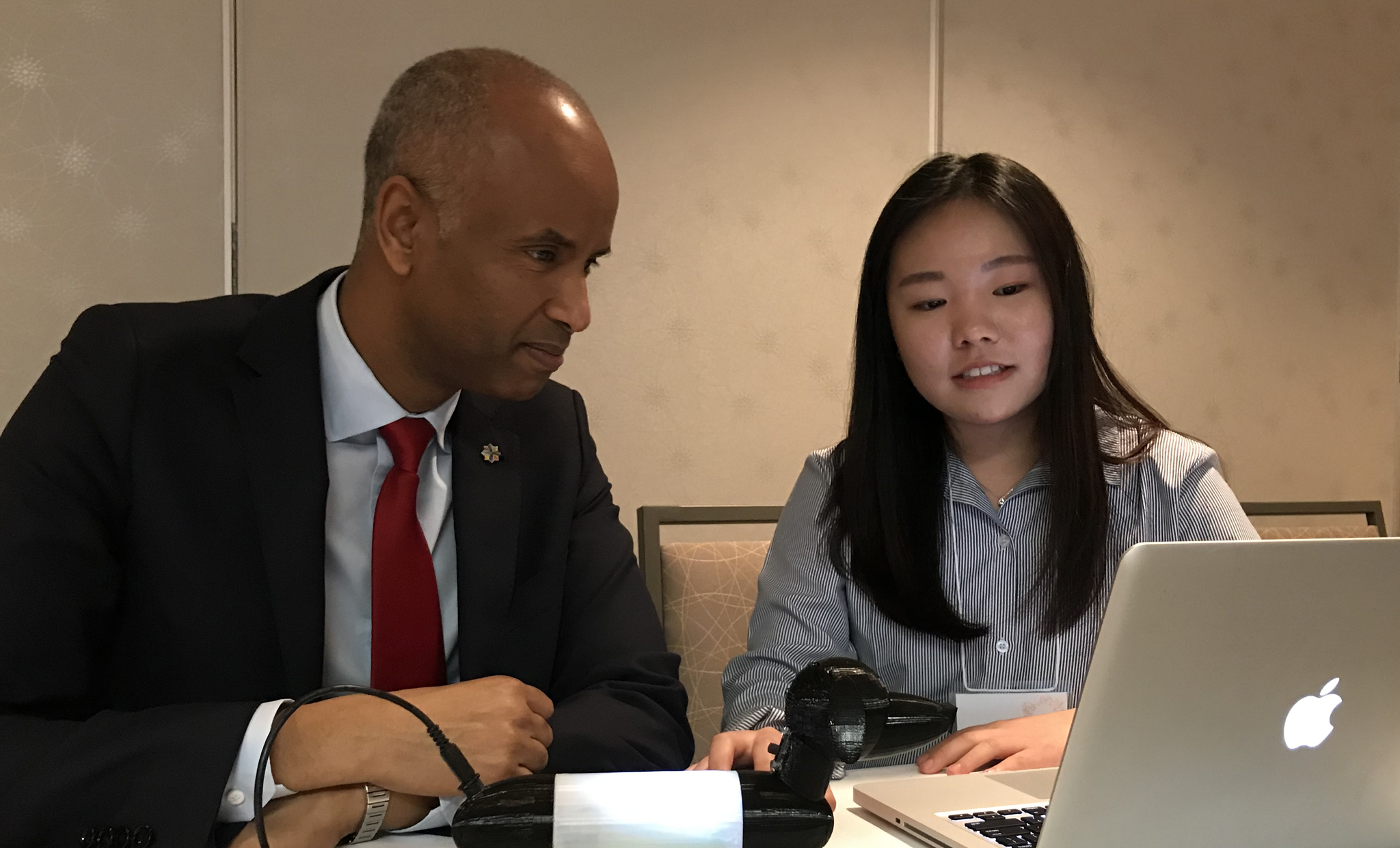 February 20, 2018 - The Honourable Ahmed D. Hussen, Minister of Immigration, Refugees and Citizenship and member of the Atlantic Growth Strategy Leadership Committee, listens intently to a presentation from a member of Riverview High School’s Engineering Brightness team February 20, 2018 in Moncton, N.B.
