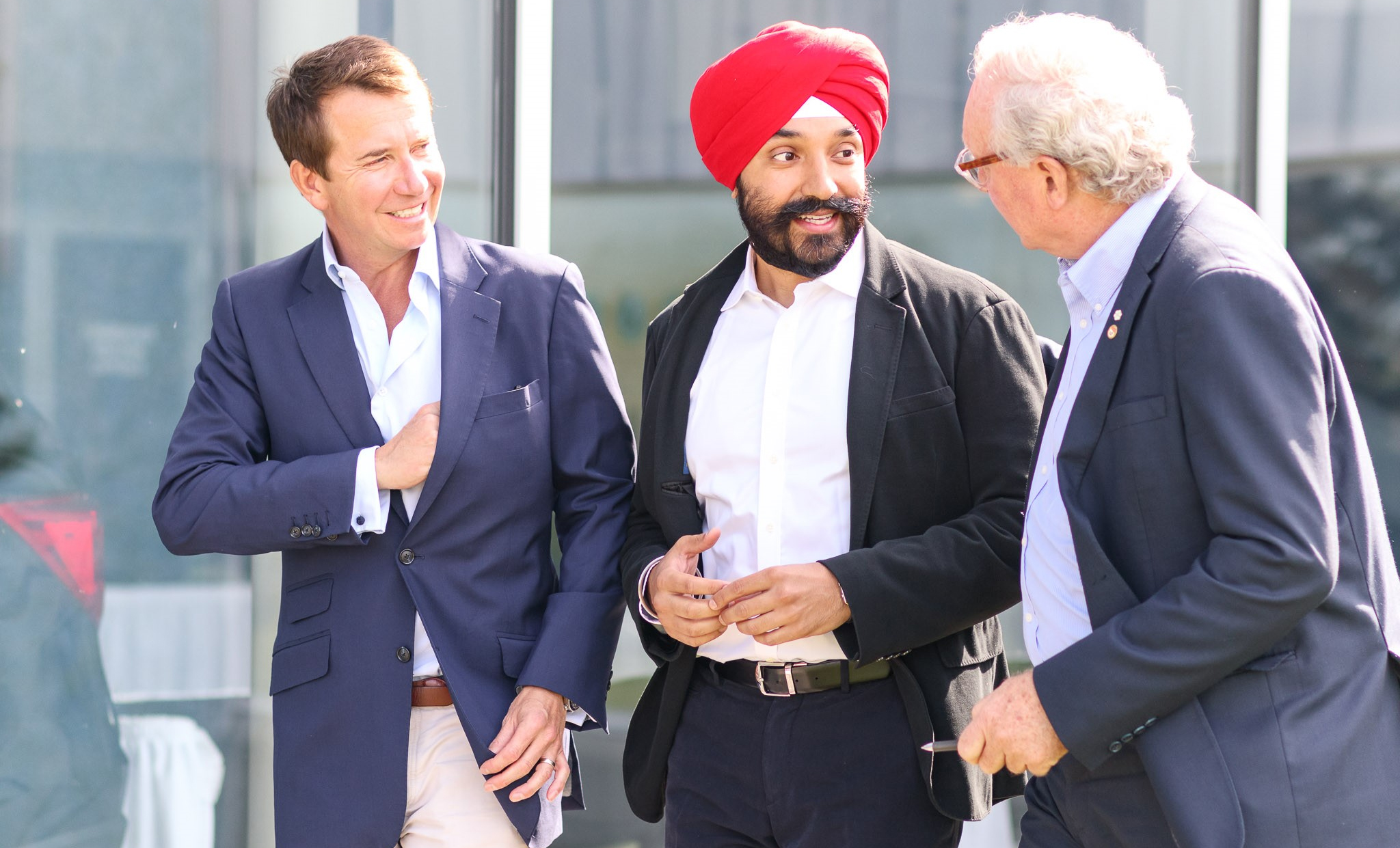 July 10, 2018 - The Honourable Scott Brison, President of the Treasury Board and the Honourable Navdeep Bains, Minister of Innovation, Science and Economic Development and Minister responsible for the Atlantic Canada Opportunities Agency have a chat with the Honourable H. Wade MacLauchlan, Premier of Prince Edward Island on their arrival to the Atlantic Growth Strategy Leadership Committee meeting in Summerside, PEI.