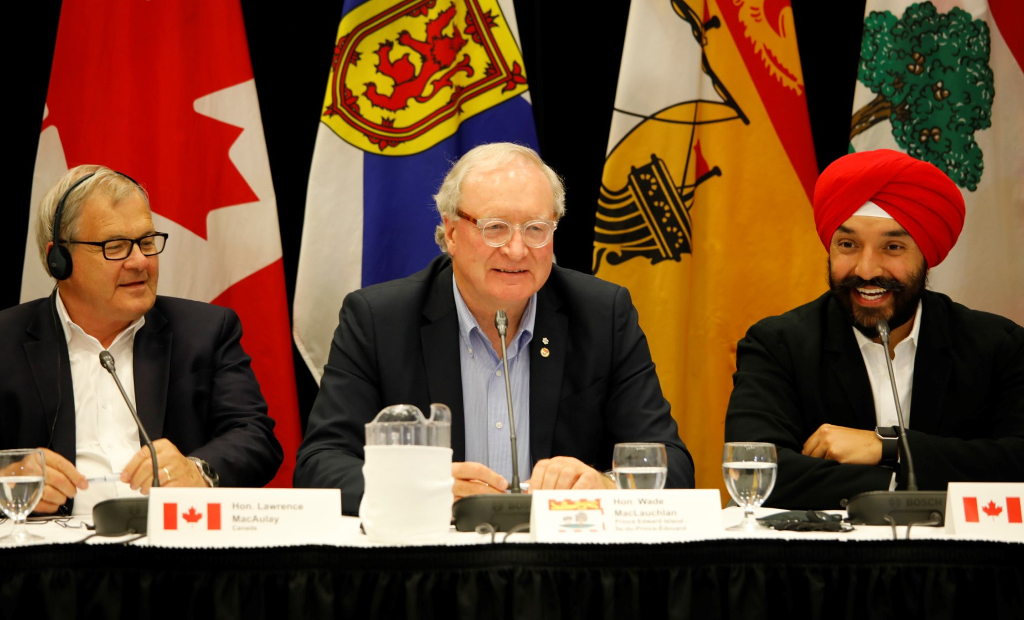 July 10, 2018 - The PEI co-hosts of the Atlantic Growth Strategy Leadership Committee meeting, Federal Agriculture and Agri-Food minister Lawrence MacAulay and Premier H. Wade MacLauchlan address members of the Committee along with Navdeep Bains, Minister of Innovation, Science and Economic Development and Minister responsible for the Atlantic Canada Opportunities Agency.