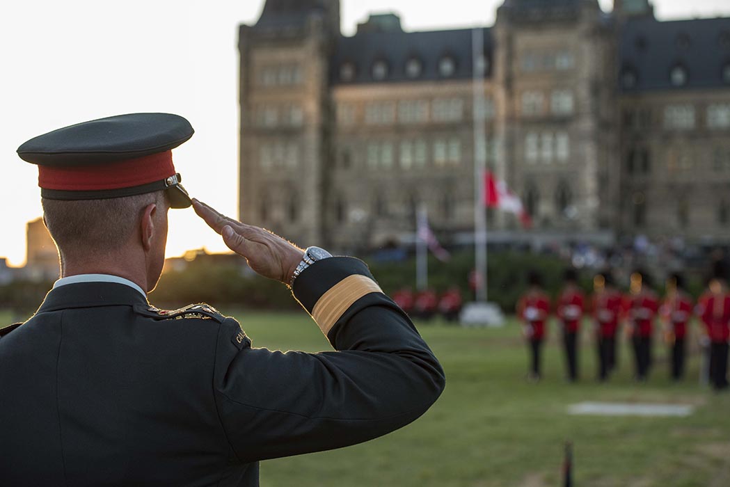 Lieutenant-General Jean-Marc Lanthier, Commander of the Canadian Army, salutes on the dais during the annual Fortissimo event on Parliament Hill in Ottawa, Ontario on July 19, 2018. Photo: Ordinary Seaman Camden Scott, Army Public Affairs. ©2018 DND/MDN Canada.