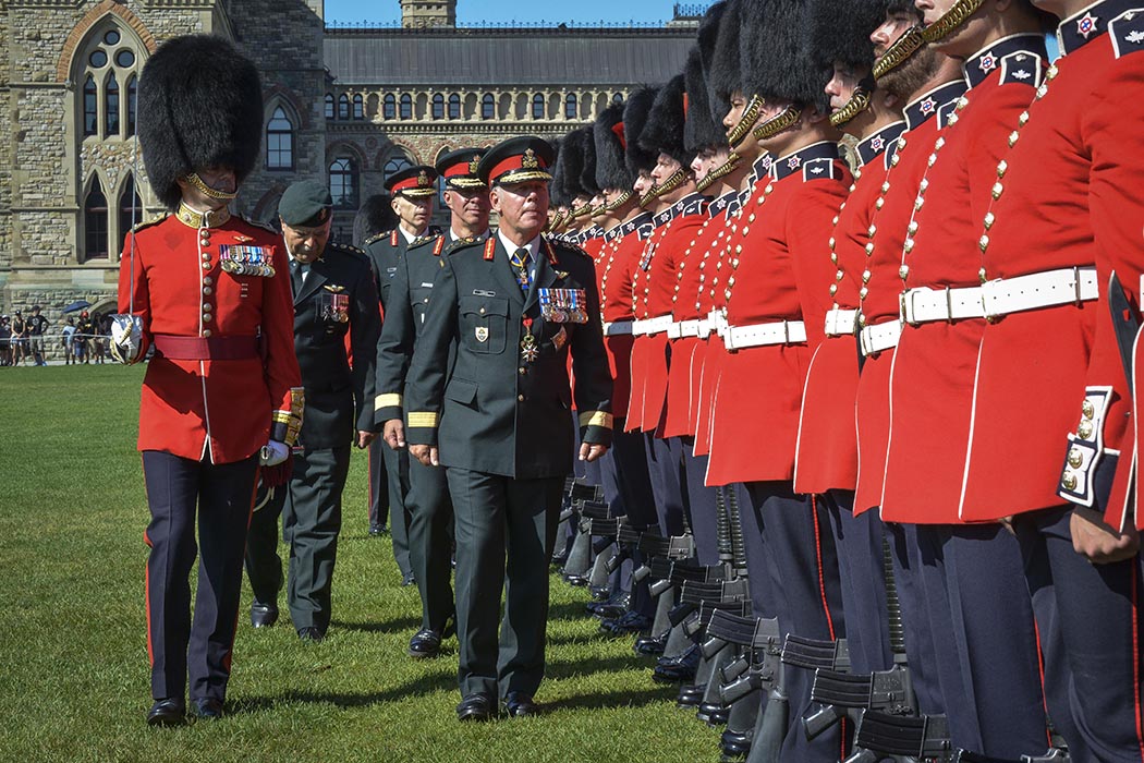 General Johnathan Vance, Canadian Chief of Defense Staff, Lieutenant- General Jean-Marc Lanthier, outgoing Commander of the Canadian Army, Lieutenant- General Wayne Eyre, incoming Commander of the Canadian Army, inspect the Ceremonial Guard during the Canadian Army Change of Command ceremony on Parliament Hill in Ottawa, Ontario on August 20, 2019. Photo: Sergeant Lance Wade, 5th Canadian Division. ©2019 DND/MDN Canada.