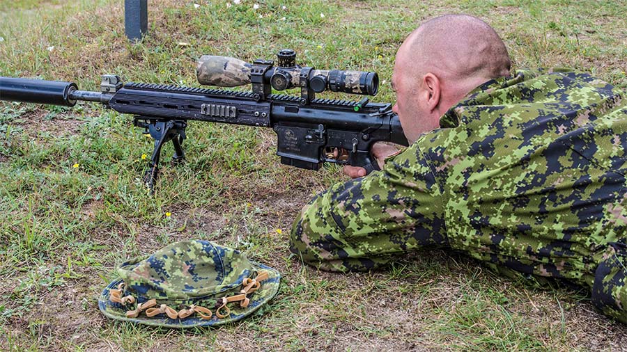 Land Task Force member sniper zeros his McMillan Tac-50 caliber, C15 Long Range Sniper Weapon (LRSW) at the shooting range in Zaworske, Poland, on July 23, 2015 during Operation REASSURANCE.