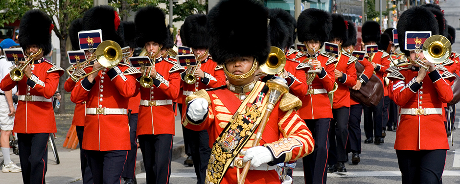 Slide - Ceremonial Guard march to Parliament Hill in their final parade of the 2008 