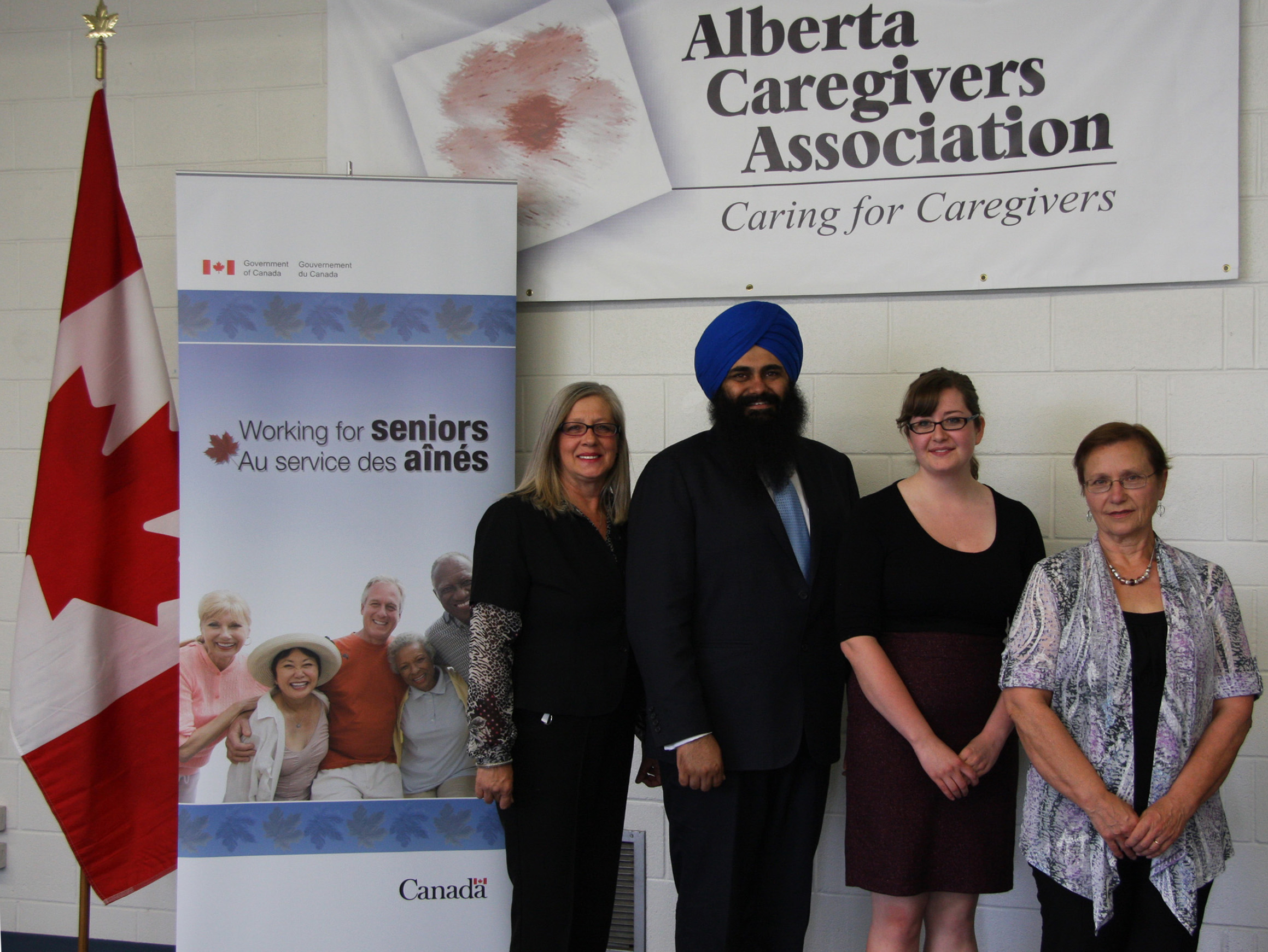 Glenda Sheard, Director, Alberta Caregivers Association, Minister of State Tim Uppal, Anna Mann, Executive Director, Alberta Caregivers Association, Bobbi Junior, Caregiver.