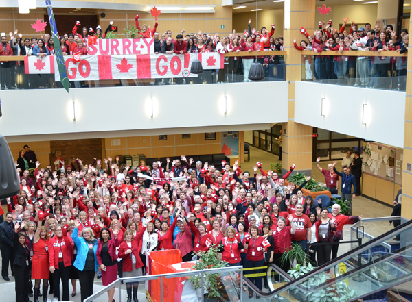 Minister Findlay celebrates the 35th anniversary of the Surrey Tax Centre with employees.