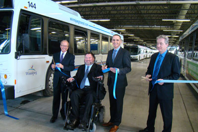 From left to right:
Winnipeg Mayor, Sam Katz, Member of Parliament for Charleswood&mdash;St. James&mdash;Assiniboia, the Honourable Steven Fletcher, the Minister of Children and Youth Opportunities and Minister responsible for Relations with the City of Winnipeg within the Department of Municipal Government, Kevin Chief, along with the Director of Winnipeg Transit, Dave Wardrop, cut the ribbon at the official opening of the City of Winnipeg's new transit parking and servicing garage.