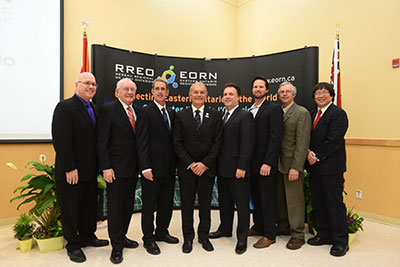 From left to right: Member of Provincial Parliament for Leeds&mdash;Grenville Steve Clark, Mr. Reeve Mel Campbell (past Warden for United Counties of Leeds Grenville), Member of Provincial Parliament for Glengarry&mdash;Prescott-Russell Grant Crack, Mr. Jean Paul St. Pierre (EOWC Chair), Member of Parliament for Leeds&mdash;Grenville Gord Brown, Mr. Luke Barker (Bell Aliant), Mr. Ted Ceelen (THC Technology), and Mr. Arnold Kwong (Storm Internet).