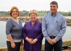 The Honourable Gail Shea, Minister of Fisheries and Oceans, and representatives of Stanley Bridge Harbour Authority pose for a picture following the announcement of a project at the harbour. From left to right, Phyllis Carr, vice-president; Minister Shea and Owen Simpson, chair. The project at Stanley Bridge will consist of the realignment of a breakwater to increase berthing capacity. 