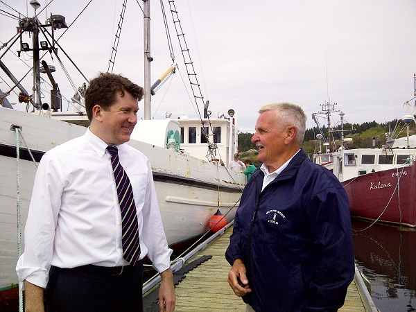 John Williamson, MP for New Brunswick Southwest, and Rudy Tucker, President of the Harbour Authority of Blacks Harbour and Beaver Harbour, tour the local harbour following the improvements project announcement to Blacks Harbour in New Brunswick. 