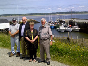 On June 24, 2014, the Honourable Gail Shea, Minister of Fisheries and Oceans announced significant funding for Cape St. Mary and Saulnierville Harbours. (L-R) Bobby Deveau, President of Cape St. Mary Harbour Authority; Greg Kerr, MP for West Nova; Minister Shea; and Pierre Comeau, Chairman of the local harbours¿ steering committee.