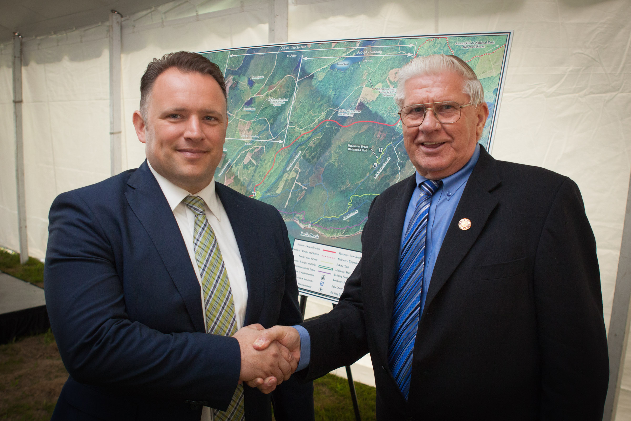 Harper and Alward Governments Deliver Funding Support to Complete the Fundy Trail Parkway 


June 25, 2014 ¿ Salmon River, NB ¿ Atlantic Canada Opportunities Agency (ACOA)

The Honourable Rob Moore, Regional Minister for New Brunswick and Minister of State (Atlantic Canada Opportunities Agency), and the Honourable David Alward, Premier of New Brunswick, today joined federal and provincial government representatives and Fundy Trail Authority officials to announce a joint contribution of $22.8 million to support the completion of the Fundy Trail Parkway.

The federal government and the Province of New Brunswick are each contributing $11.4 million to the project through various programs. 

Pictured here, in front of the plan to develop and complete the Fundy Trail Parkway, are: Minister Moore and Harley Tingley, President of the Fundy Trail Development Authority Inc.
