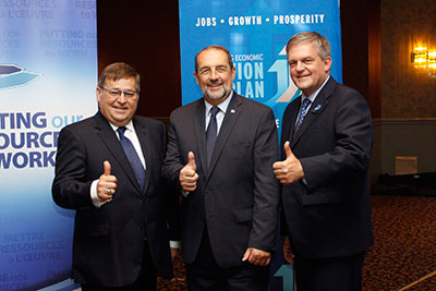 From left to right: Minister Claude Williams; Minister Denis Lebel; and New Brunswick Premier David Alward announcing upgrades to Route 11 in Moncton as the first project identified under the New Building Canada Fund in NB.