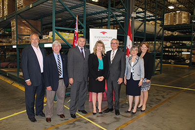 From left to right: Don Streuber  Chair of the Board of Directors, CentrePort Canada;  Chris Lerm, Rosedale Transport Regional Manager;  James Bezan, Member of Parliament for Selkirk-Interlake; Minister Shelly Glover; Minister Stan Struthers;   Reeve Frances Smee;   Diane Gray, President and CEO, CentrePort Canada at the announcement of the first project identified under the New Building Canada Fund in MB.