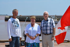 The Honourable Gail Shea, Minister of Fisheries and Oceans, and representatives of the West Point Harbour Authority, Paul Wood, Chair, and Keith Paugh, Director, following the announcement of a project at the harbour. The project at West Point harbour will consist of the reconstruction of a breakwater and construction of a service area. The project will be carried out over a two-year period. 