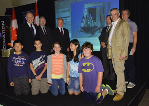 On July 17, 2014, Treasury Board President Tony Clement announced the Canadian Space Agency's contribution to the OSIRIS-Rex mission. The mission will use Canadian laser optic technology, like the device that took the 3-D image shown on screen, to scan an asteroid, and choose the best area of its surface to collect sample that will be returned to Earth for study.