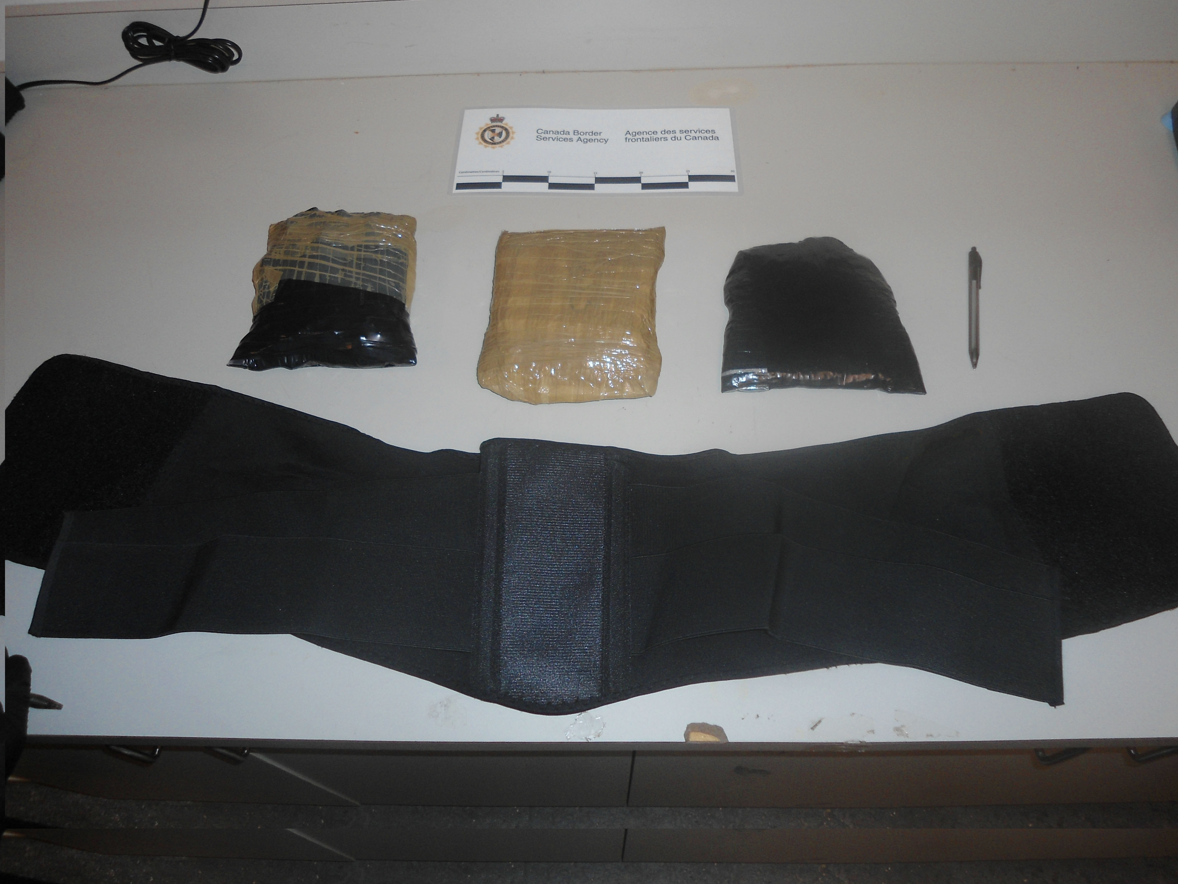 Strapped narcotics confiscated from traveller on June 7, 2014 at the Vancouver International Airport