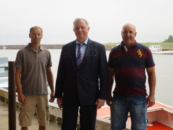 Robert Goguen, Moncton-Riverview-Dieppe MP, and representatives of the Chockpish Harbour Authority pose for a picture following the funding announcement for small craft harbours throughout Eastern New Brunswick. From left to right: Gilles Caissie, President, MP Goguen and Paul LeBlanc, vice-President.