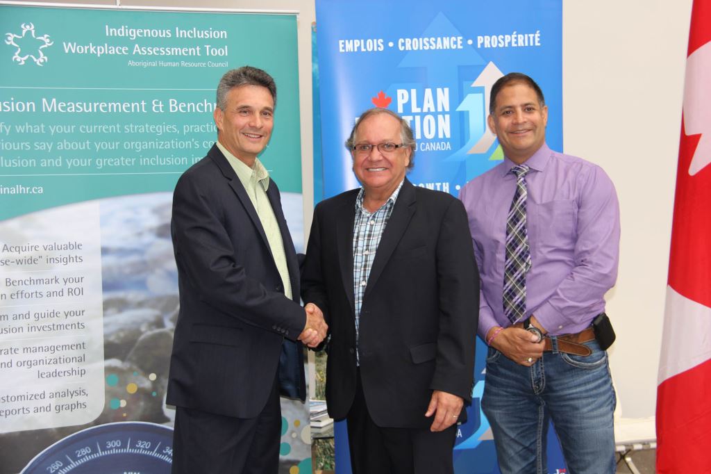 Mr. Kelly Lendsay, President and CEO, Aboriginal Human Resource Council, the Honourable Bernard  Valcourt, Minister of Aboriginal Affairs and Northern Development, and Rob Clarke,  Member of Parliament for Desnethé¿Missinippi¿Churchill River, posing for a photo during a funding announcement in Saskatoon.