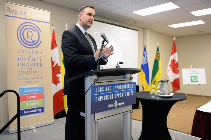 Industry Minister James Moore discusses removing internal trade barriers during his address to the Regina and District Chamber of Commerce.