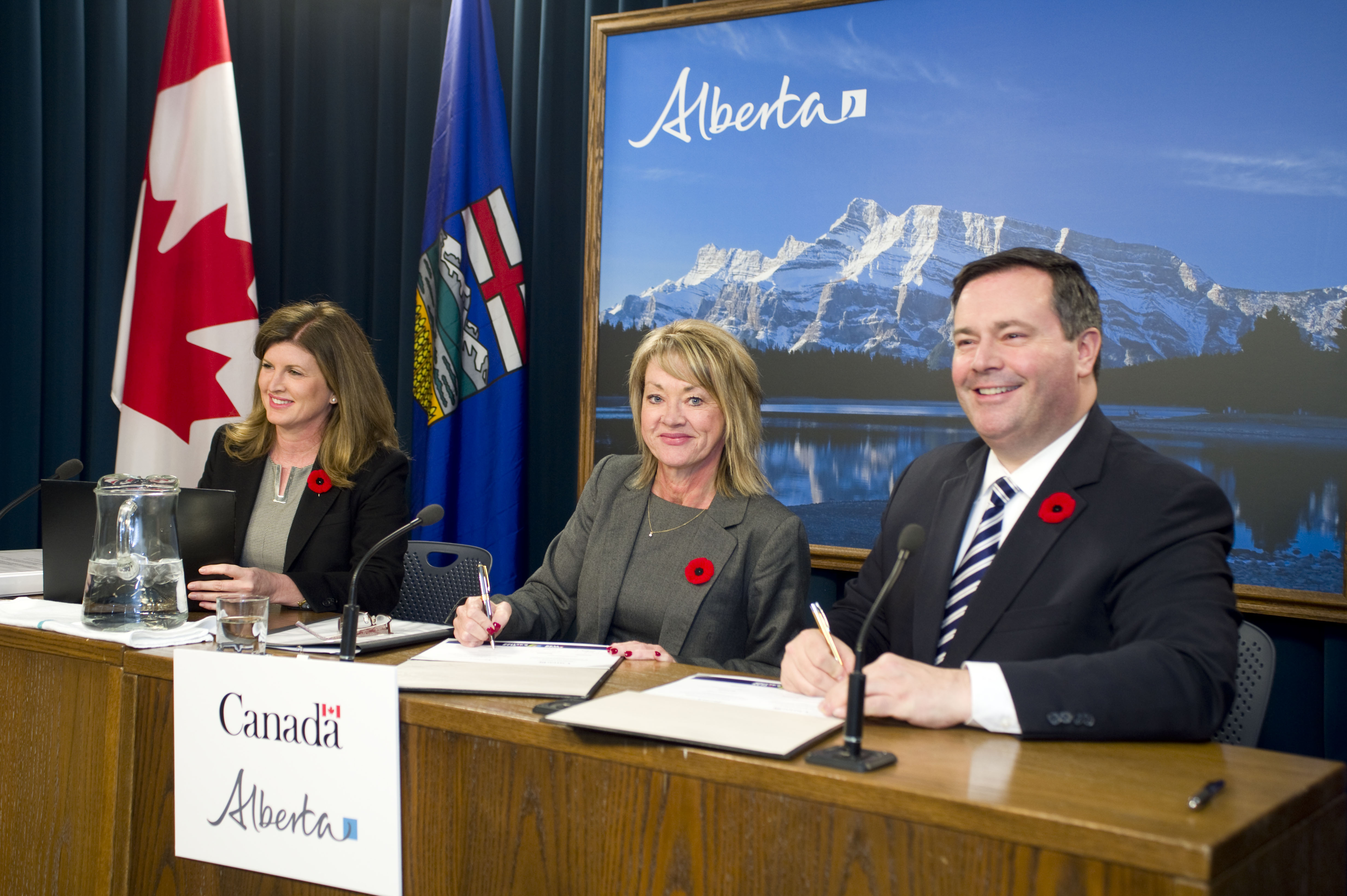 Minister Ambrose, Minister McQueen, and Minister Kenney celebrate a renewed federal Gas Tax Fund agreement for Alberta.
