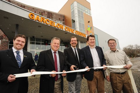 From Left to Right: John Ames, MLA for Charlotte-Campobello, the Honourable Rick Doucet, New Brunswick Minister of Economic Development and Minister of Agriculture, Aquaculture and Fisheries, His Worship John Quartermain, Mayor of St. Stephen, John Williamson, Member of Parliament for New Brunswick Southwest and Richard Fulton, President of Civic Center Project, at the official ribbon-cutting ceremony of the new Garcelon Civic Center.