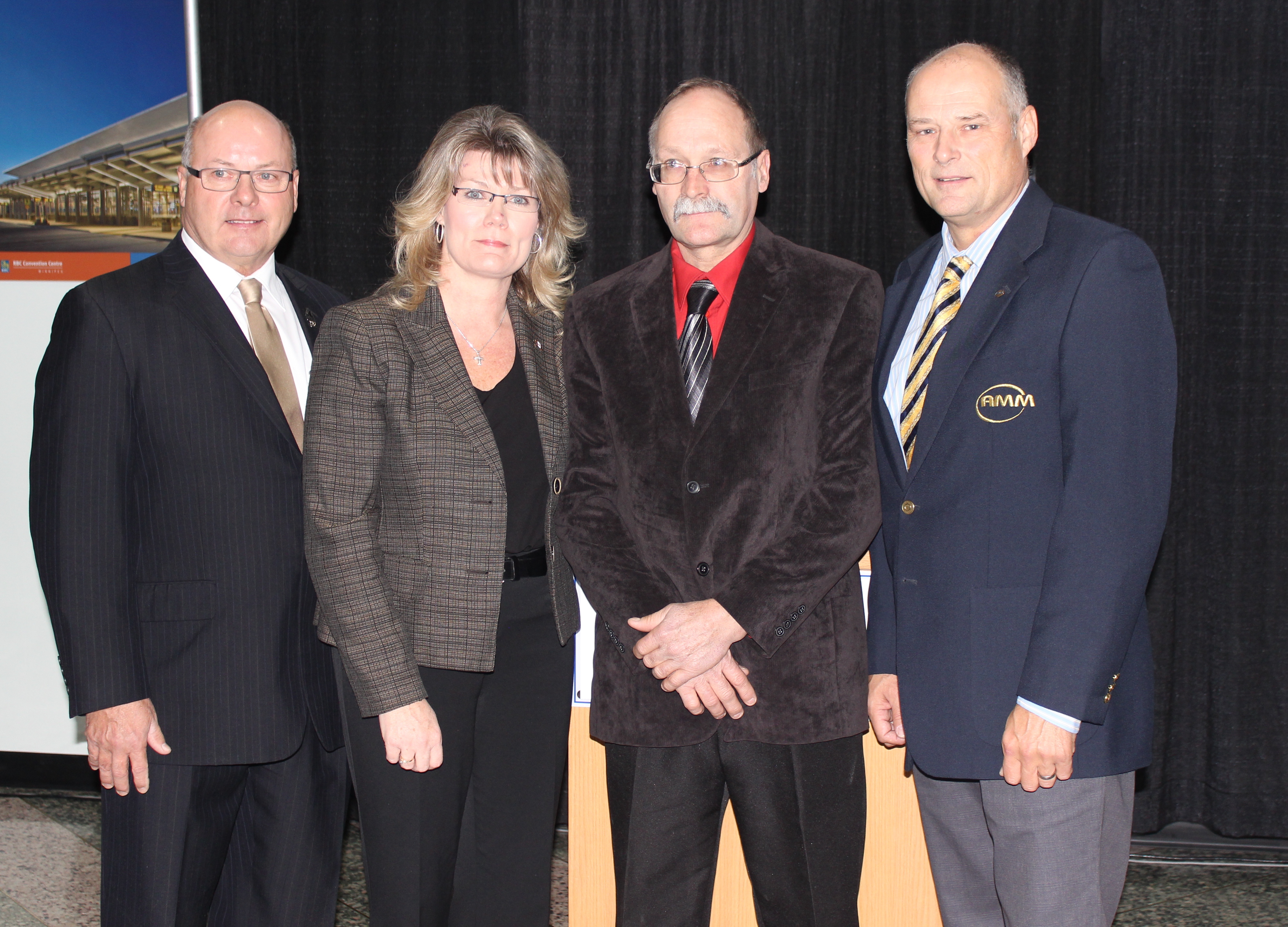 From left to right: Doug Dobrowolski, President of the Association of Manitoba Municipalities, the Honourable Shelly Glover, Minister of Canadian Heritage and Official Languages, Rod Berezowecki, Reeve of the Rural Municipality of Kelsey and the Honourable Drew Caldwell, Minister of Manitoba Municipal Government at the funding announcement for three northern region projects in the province of Manitoba, under New Building Canada Plan's Small Communities Fund.
