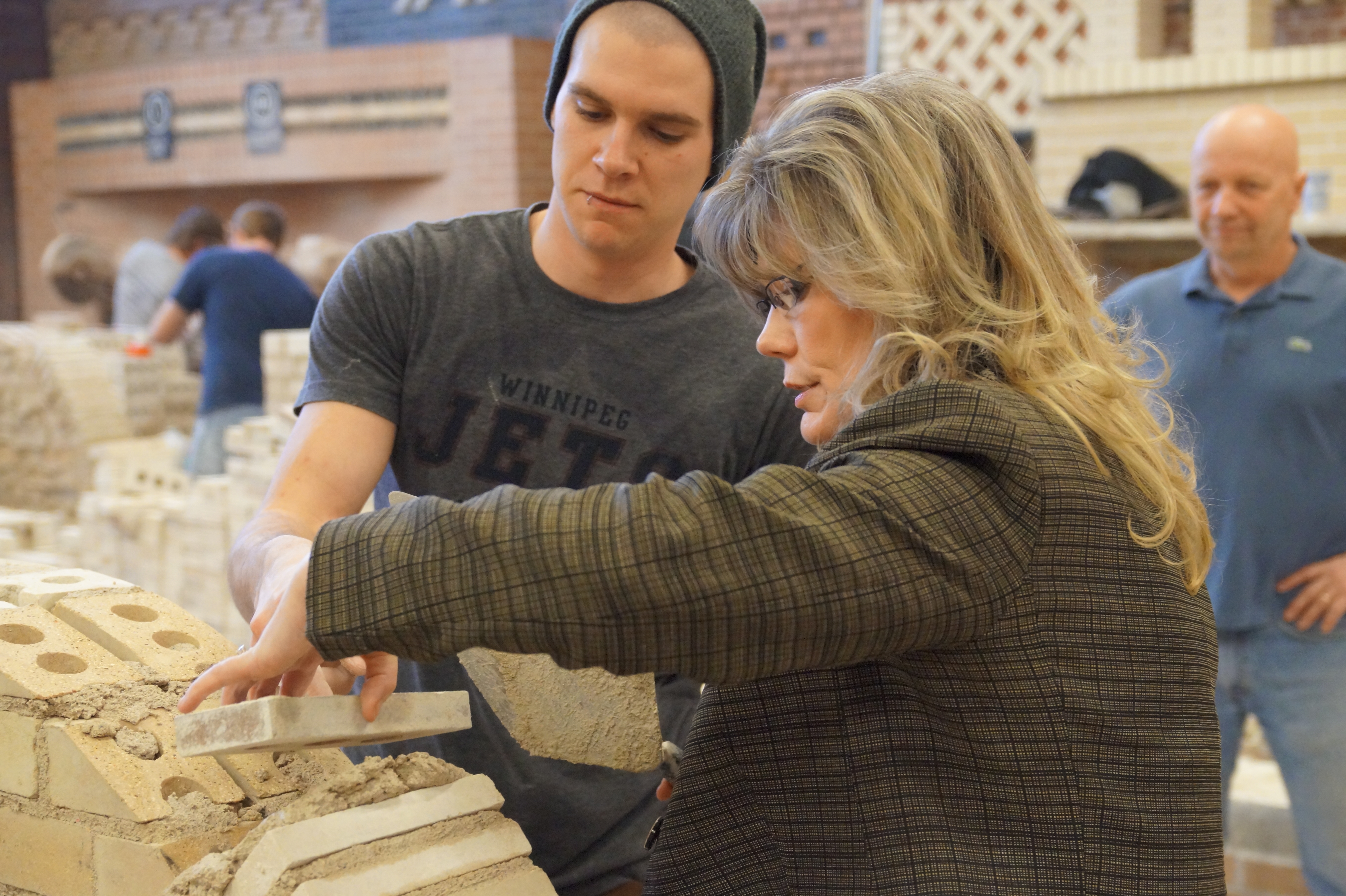 Minister Glover with Peter Morran, a second level apprentice.