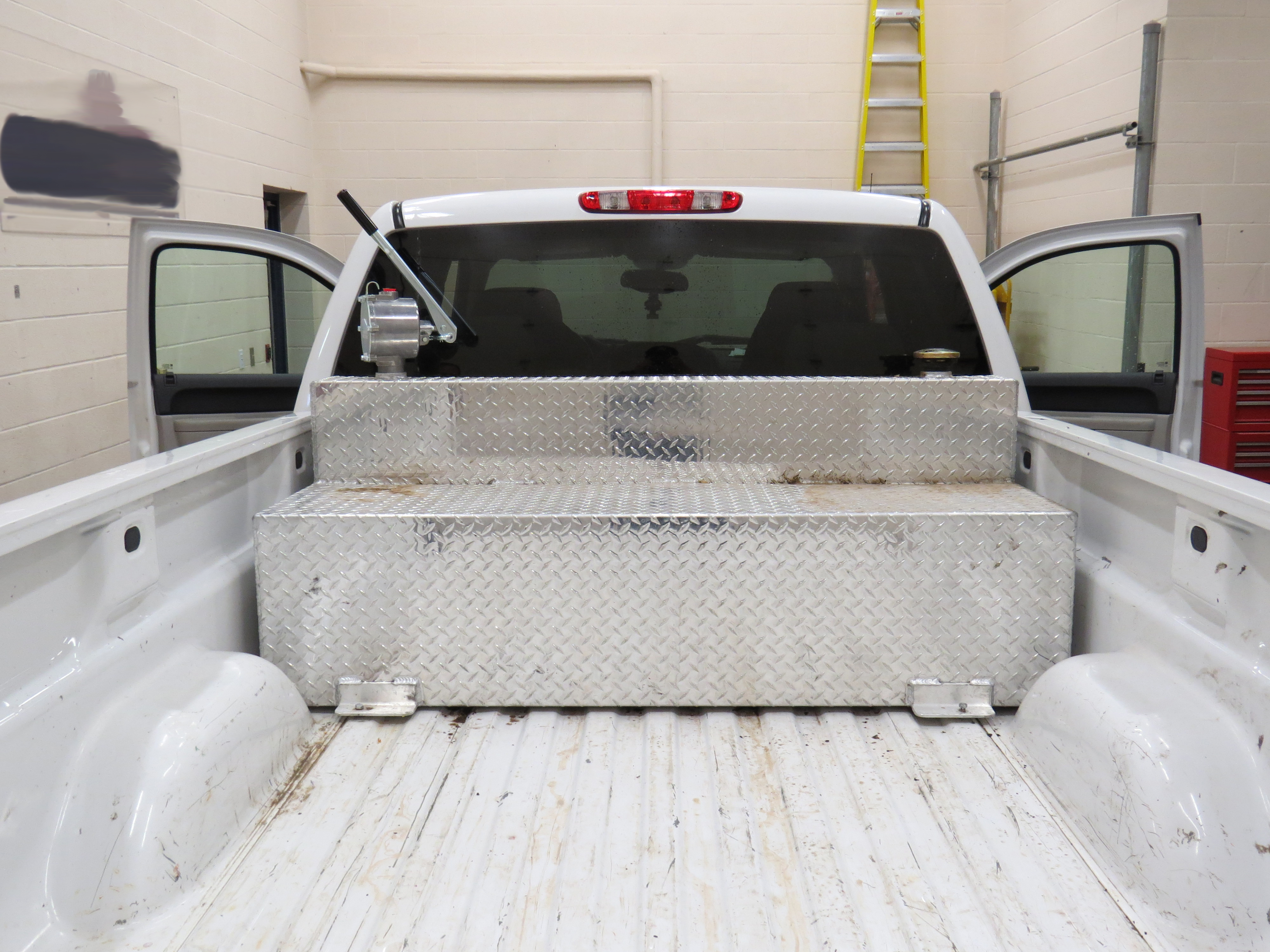 On June 17, 2014, officers at Carway found a woman concealed in a modified truck compartment measuring 16 inches high by 14 inches deep by 5.5 feet wide