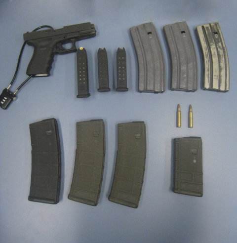 Prohibited 9mm handgun and 10 undeclared prohibited overcapacity magazines seized by officers in Emerson on September 25, 2014