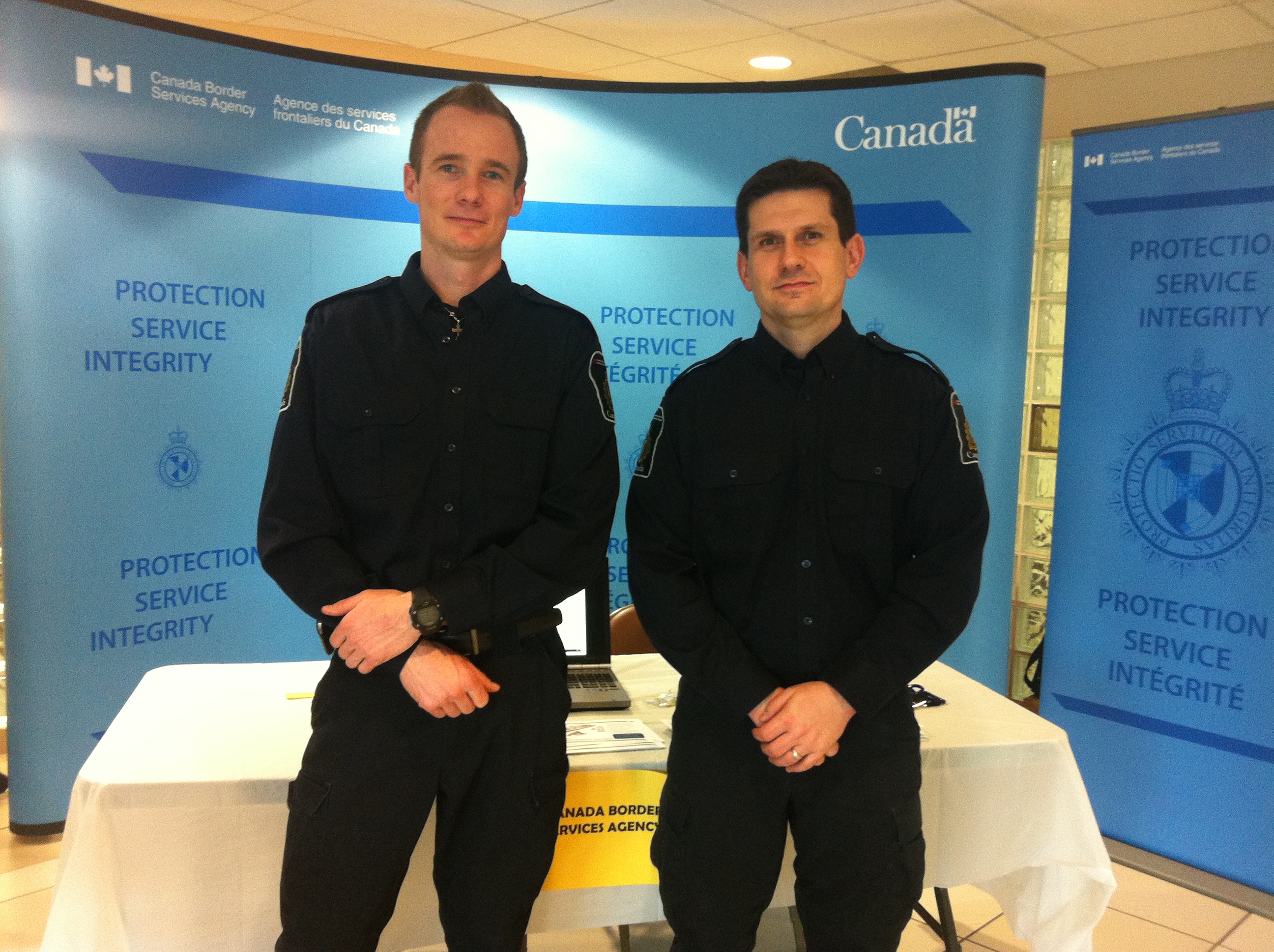 Superintendent Trevor Smith and Officer Ryan Meyer at the Medicine Hat College career fair on February 25, 2015.


