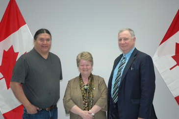 From left to right, M. Cyril Polchies, President of the Richibucto Harbour Authority, the Honourable Gail Shea, Minister of Fisheries and Oceans, and Robert Goguen, Member of Parliament for Moncton-Riverview-Dieppe,  pose for a picture after an announcement of $7.5 in repairs and improvement to the small craft harbours in Southeast New Brunswick.