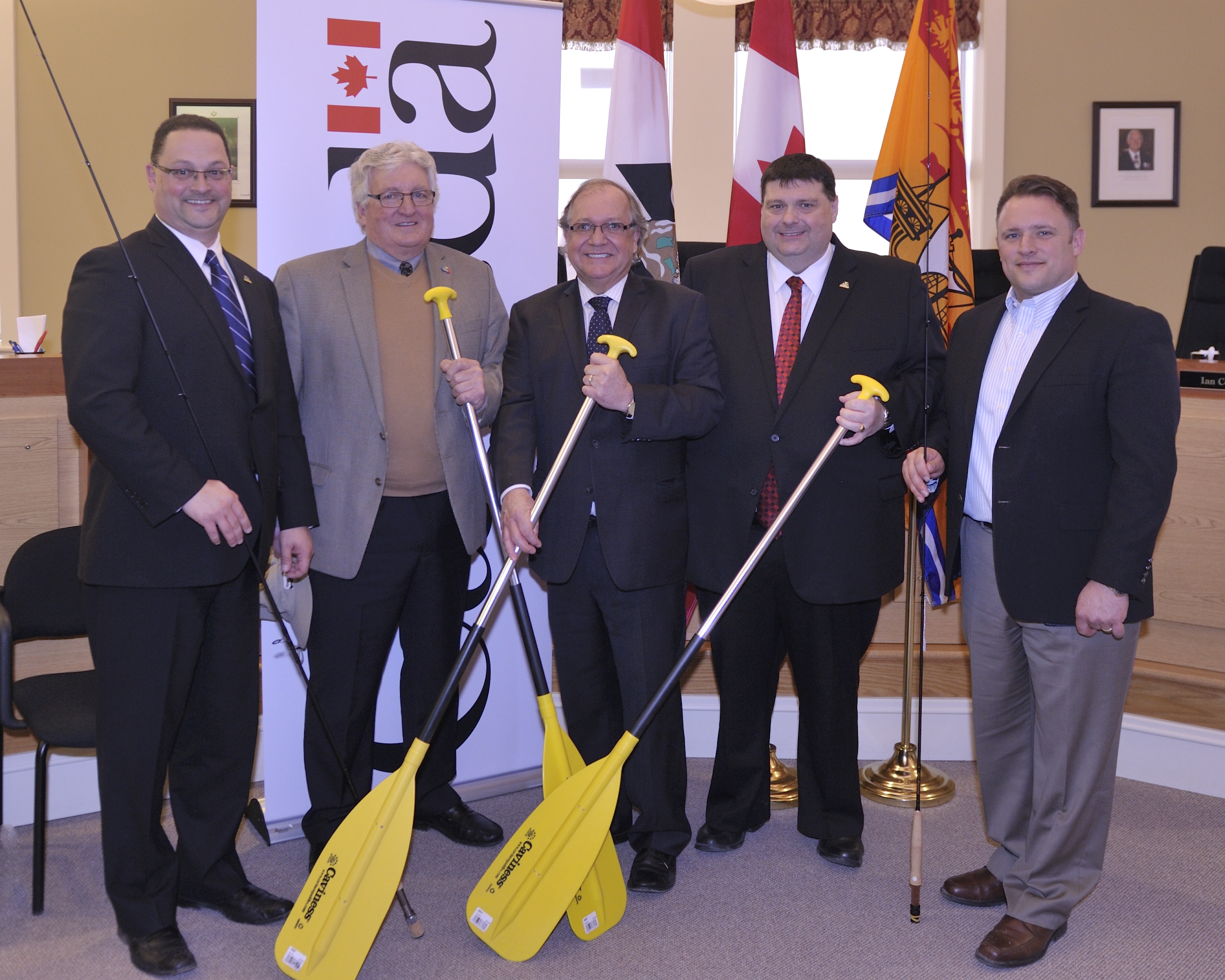 The new Restigouche River Experience Centre in Campbellton will soon be a reality thanks to investments by the governments of Canada and New Brunswick.

The Honourable Bernard Valcourt, the Honourable Rob Moore, the Honourable Donald Arseneault, and the Honourable Bill Fraser, joined representatives of the City of Campbellton to make the announcement today.

The project includes the construction of a tourist experience and interpretation centre showcasing the cultural heritage and ecosystem of the Restigouche River. 

Pictured here (left to right) Minister Arseneault,  Campbellton Mayor Bruce MacIntosh,  Minister Valcourt, Minister Fraser and Minister Moore.  
