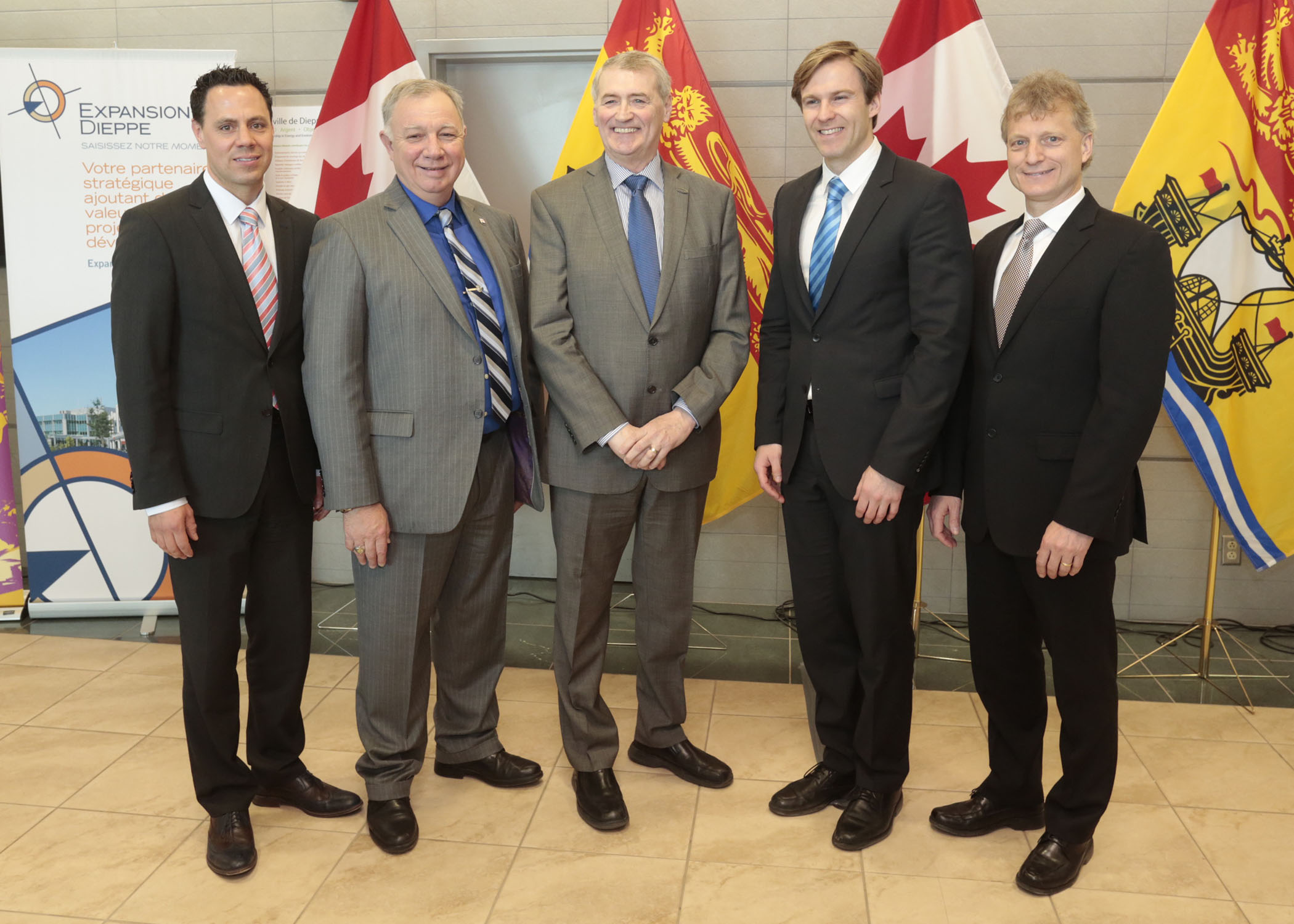 Pictured here celebrating the good news are: Alain Parent, President of the Board of Directors of Expansion Dieppe ; Robert Goguen, Parliamentary Secretary to the Minister of Justice and Member of Parliament for Moncton-Riverview-Dieppe, on behalf of the Honourable Rob Moore, Minister of State (ACOA); Yvon Lapierre, Mayor of Dieppe; the Honourable Brian Gallant, Premier of New Brunswick and the Honourable Roger Melanson, Minister of Finance, Minister of Transportation and Infrastructure and MLA for Dieppe.