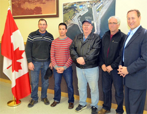 Harbour Authority representatives Colin MacDonald, Dustin MacInnis, Donald Dodge, and Daniel MacLellan with Minister MacKay.