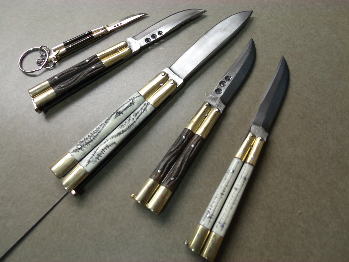 Five butterfly knives seized by border services officers at Regina Airport.