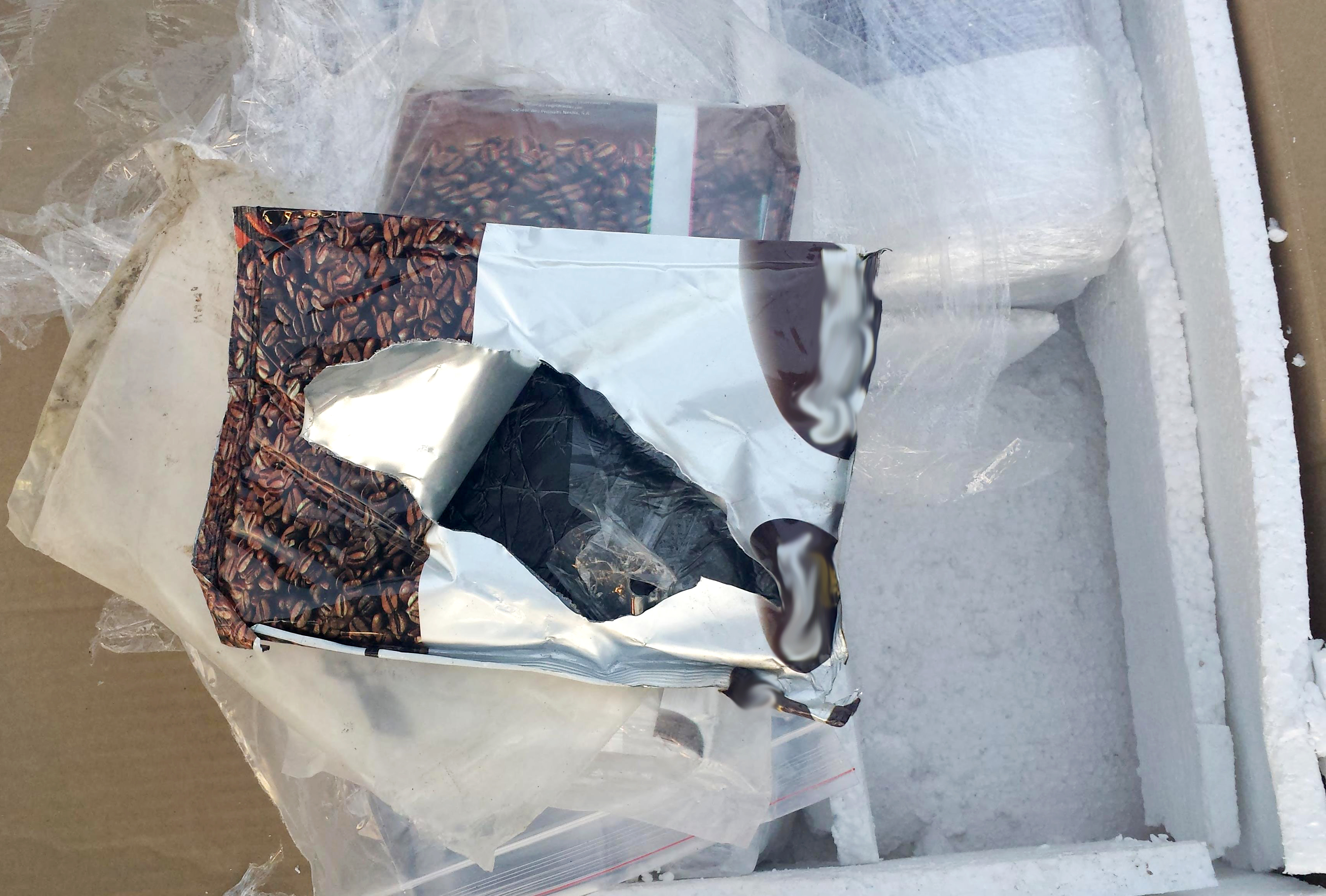 Upon opening the boxes, border services officers found hashish hidden in bags of coffee.