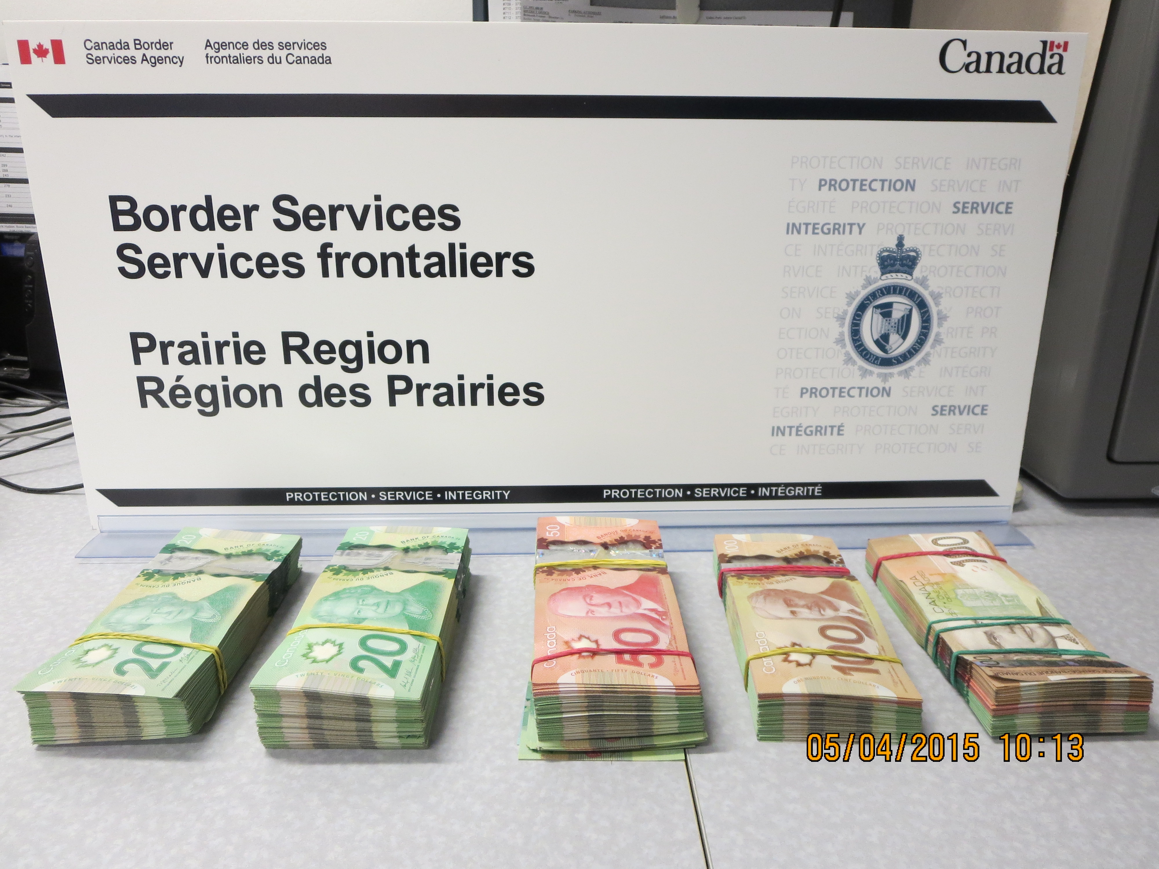Emerson CBSA officers seized undeclared cash from a pair of travellers as suspected proceeds of crime, in May