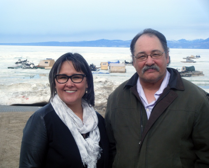 Pictured (left to right) in front of the proposed site, Joe Enook, Nunavut¿s Member of Legislative Assembly for Tununiq joined the Honourable Leona Aglukkaq, Minister of the Environment, Minister of the Canadian Northern Economic Development Agency, Minister for the Arctic Council and Member of Parliament for Nunavut to announce federal funding of up to $30 million to establish a new marine and small craft harbour at Pond Inlet, Nunavut.