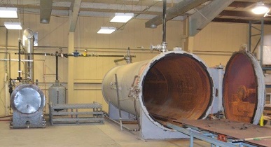 A boiler and 5¿x22¿ steam powered autoclave for curing rubber lined products at Eastern Composite Services¿ facility in Argentia, NL.