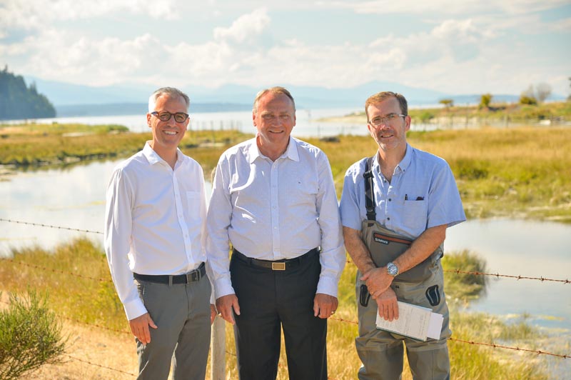 Michael Meneer, Vice President, Pacific Salmon Foundation; the Honourable John Duncan, Minister of State and Chief Government Whip, and MP for Vancouver Island North; and James Craig, Senior Project Manager, British Columbia Conservation Foundation, at Little Qualicum Estuary.