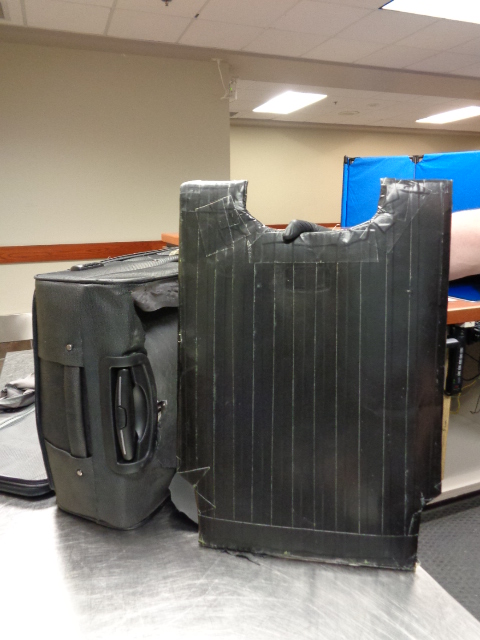 Packaged heroin removed from luggage lining at Halifax Stanfield International Airport, February 14, 2016.