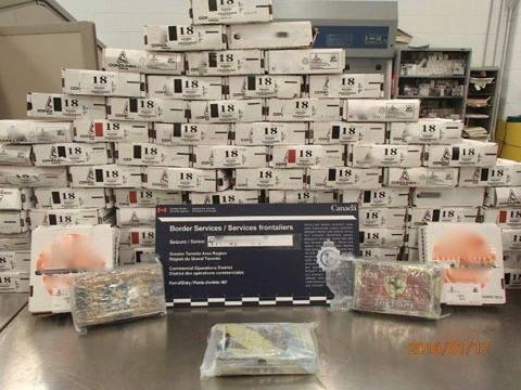 Individual cardboard boxes with suspected cocaine inside