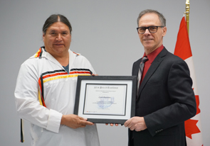 Pat Finnigan, Member of Parliament for Miramichi¿Grand Lake, presented Mr. Cyril Polchies with Fisheries and Oceans Canada¿s Prix d'Excellence Award in recognition of his remarkable contribution to the Richibucto Harbour Authority from the Small Craft Harbours Program. From left to right: Mr. Cyril Polchies, recipient and Mr. Finnigan. 