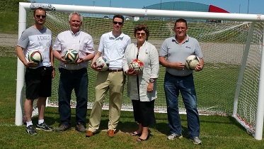 Brent Watkins, President of the Stephenville Minor Soccer Association; Mayor Tom O¿Brien; John Finn, MHA for Stephenville - Port au Port; MP Gudie Hutchings; and Ross White, Manager of the Stephenville Dome (L to R) visit the Stephenville soccer field. Players and spectators alike are enjoying their upgrade facilities thanks to almost $100,000 from CIP 150.