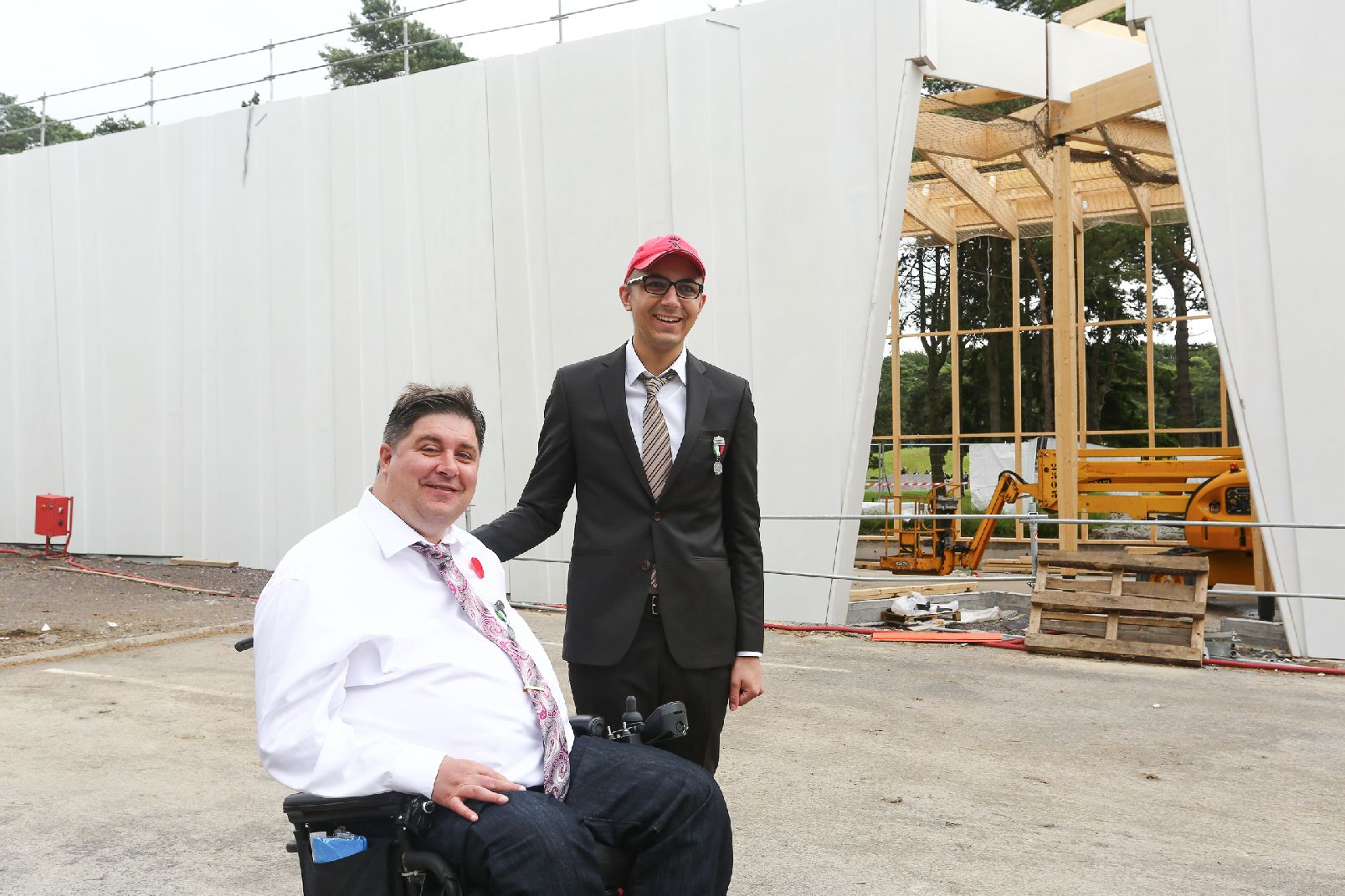 The Honourable Kent Hehr, Minister of Veterans Affairs and Associate Minister of National Defence and Xavier Delporte representing the Vimy Foundation visit the construction site for the new Visitor Education Centre at Vimy.