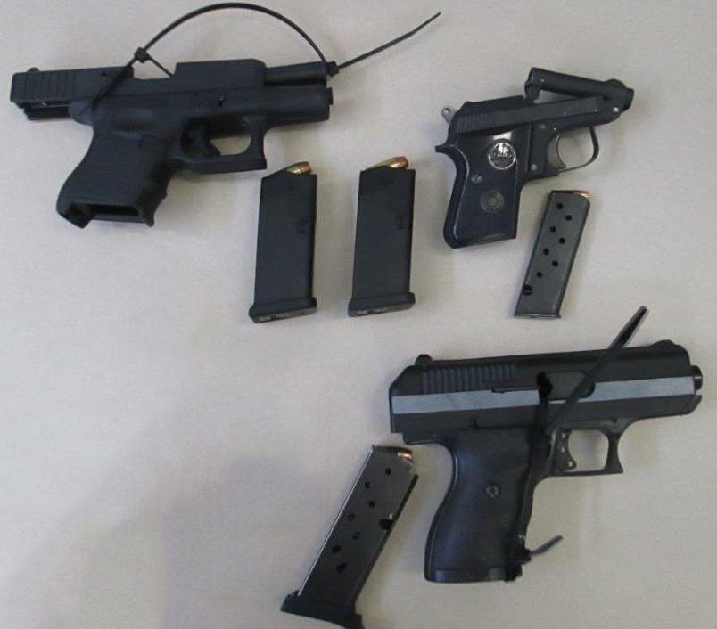 Firearms and magazines seized by CBSA officers at the Prescott port of entry on July 17, 2016.