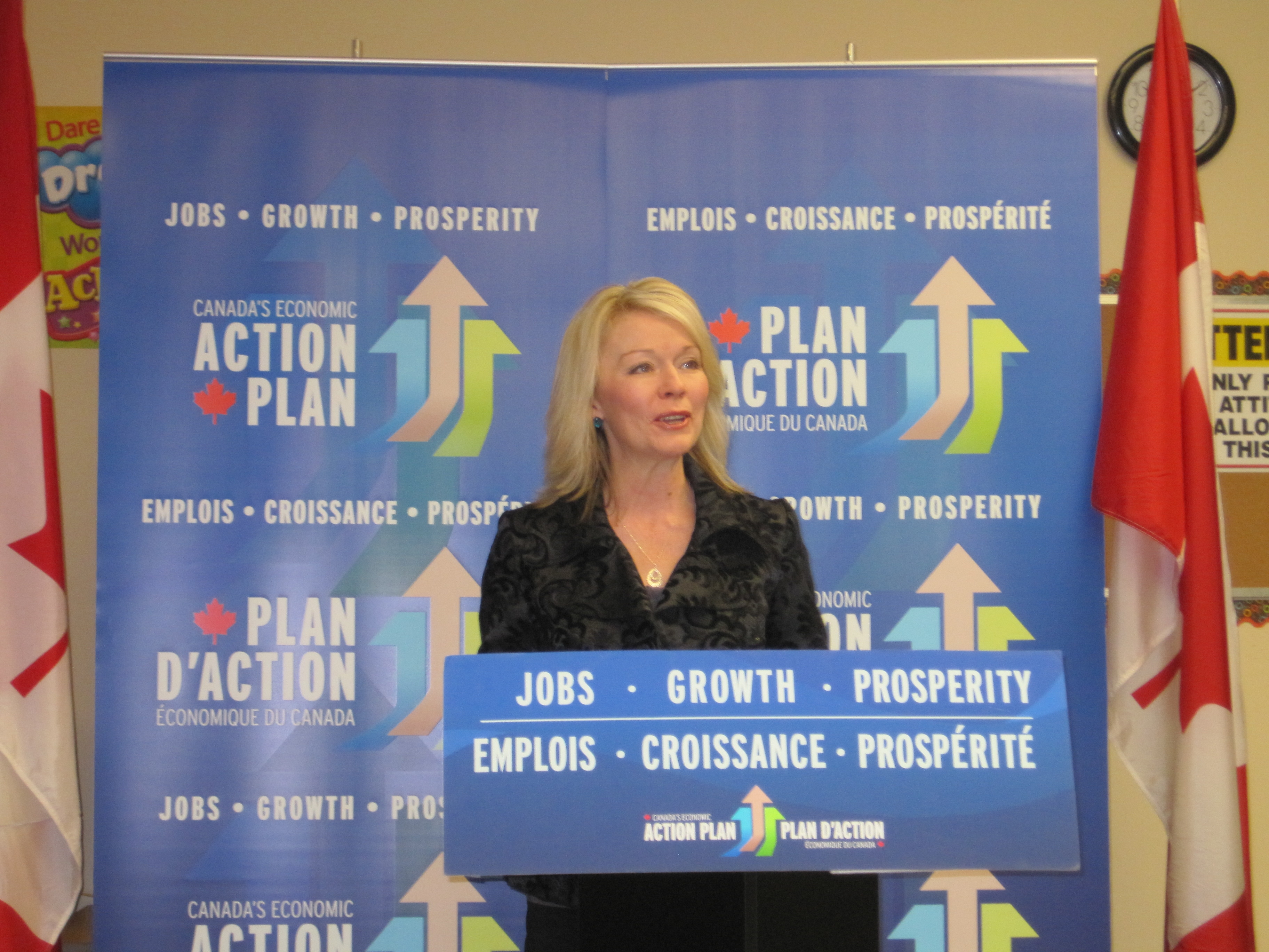 Minister of State Bergen at the podium.