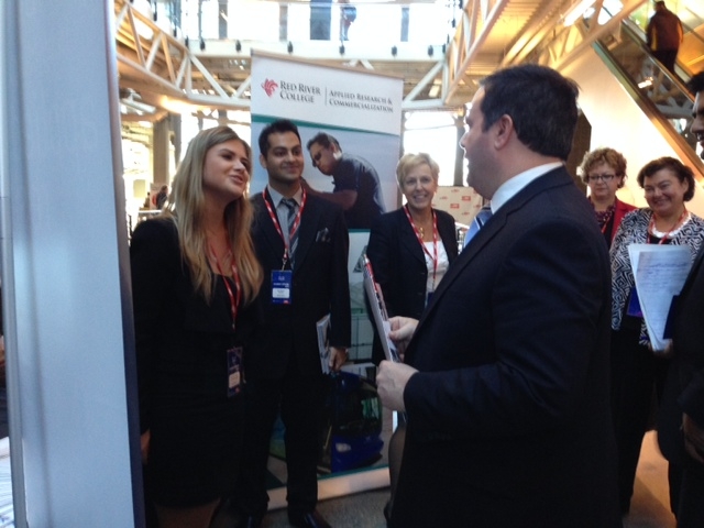 Minister Kenney interacting with SAIT Polytechnic students following his address.